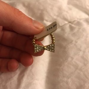 Brand new Angl Bow gold ring